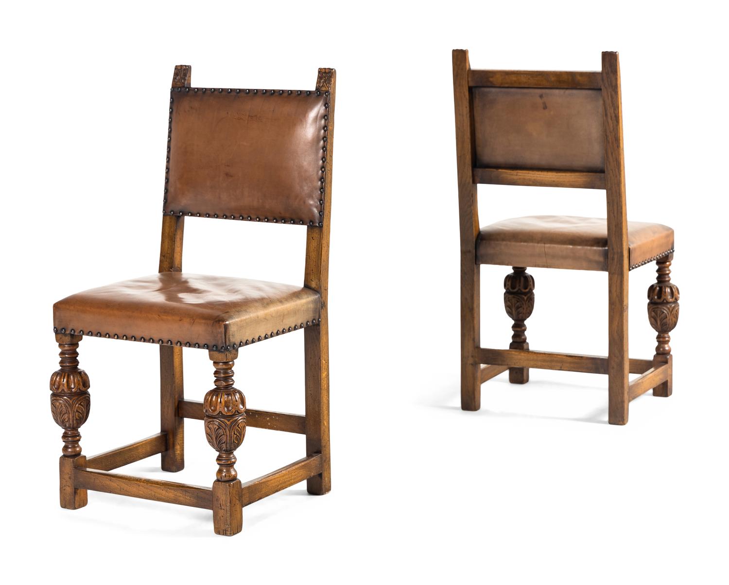 A Set of Eight Jacobean Style Oak Dining Chairs