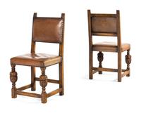 A Set of Eight Jacobean Style Oak Dining Chairs