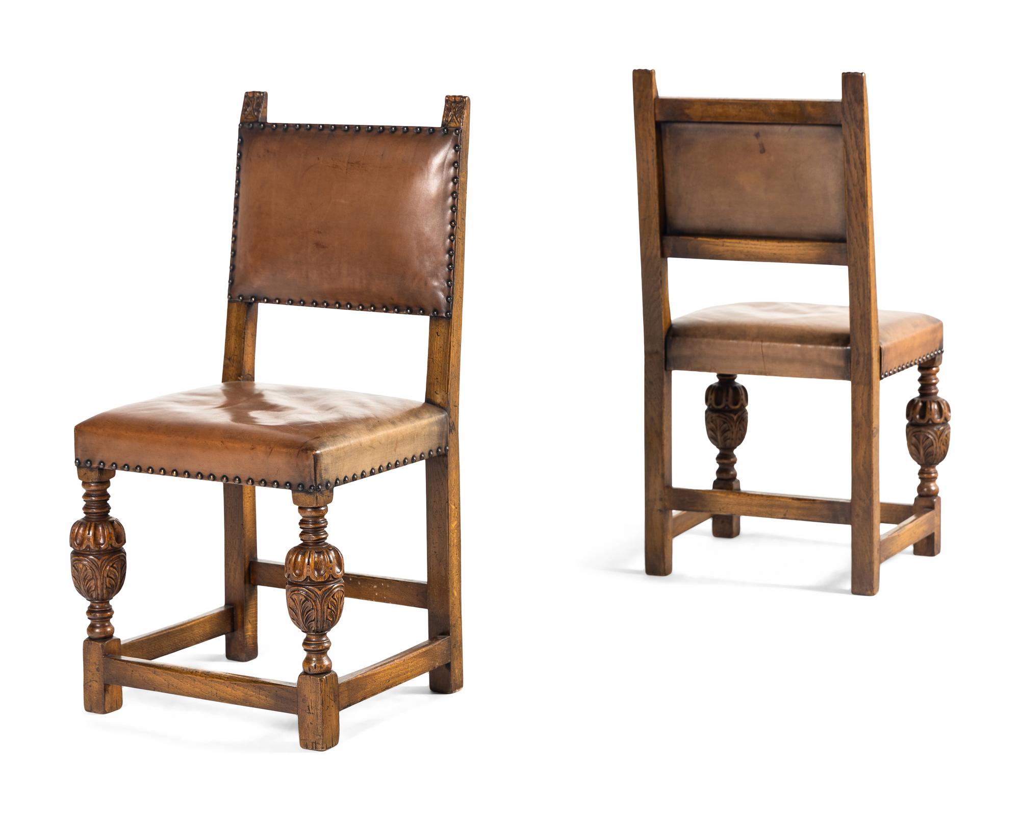 A Set of Eight Jacobean Style Oak Dining Chairs