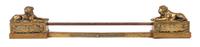 A Pair of Brass Mastiff Chenets Width 13 1/2 inches.