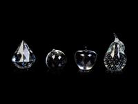 A Collection of Nine Glass Paperweights