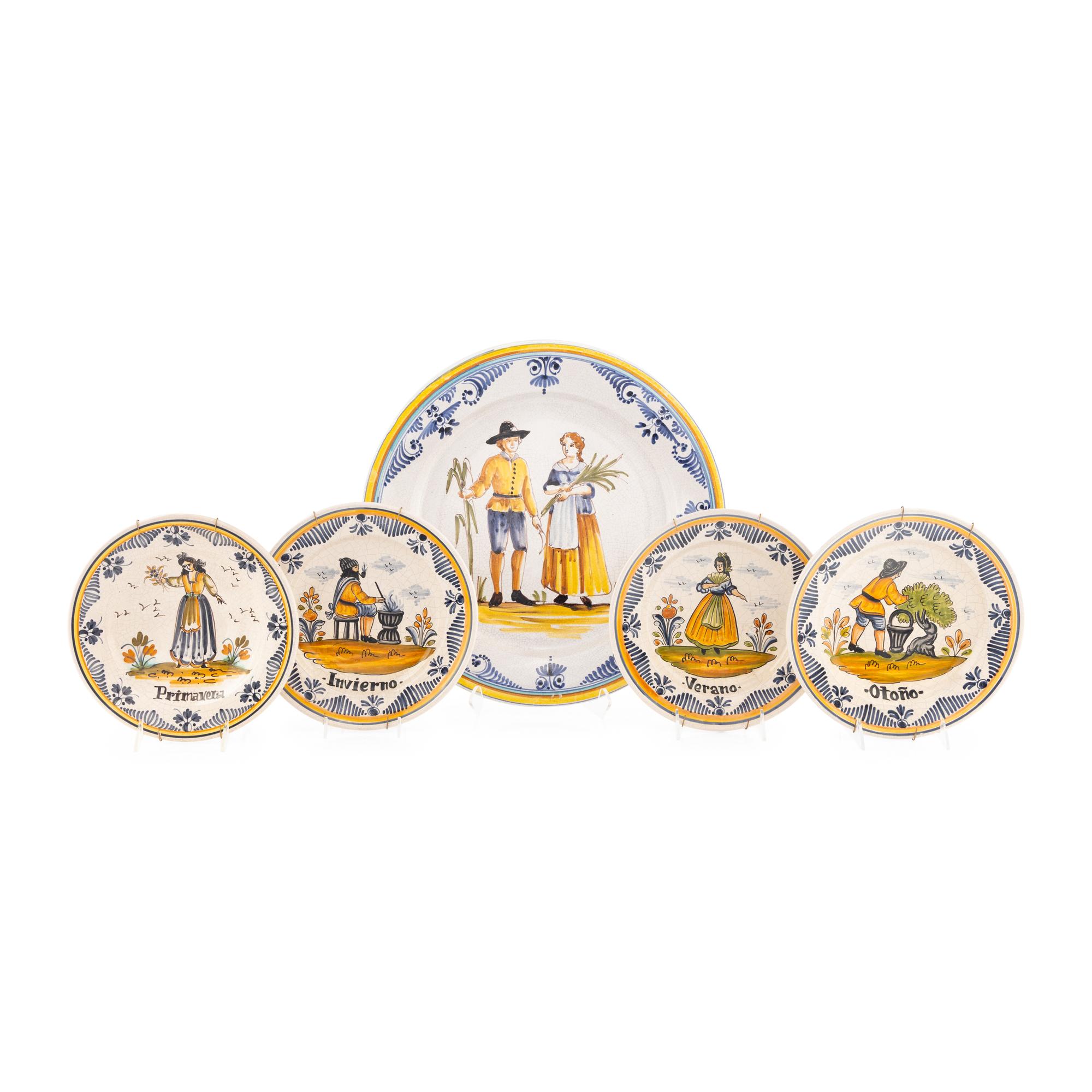 A Spanish Majolica Charger and Four Cabinet Plates