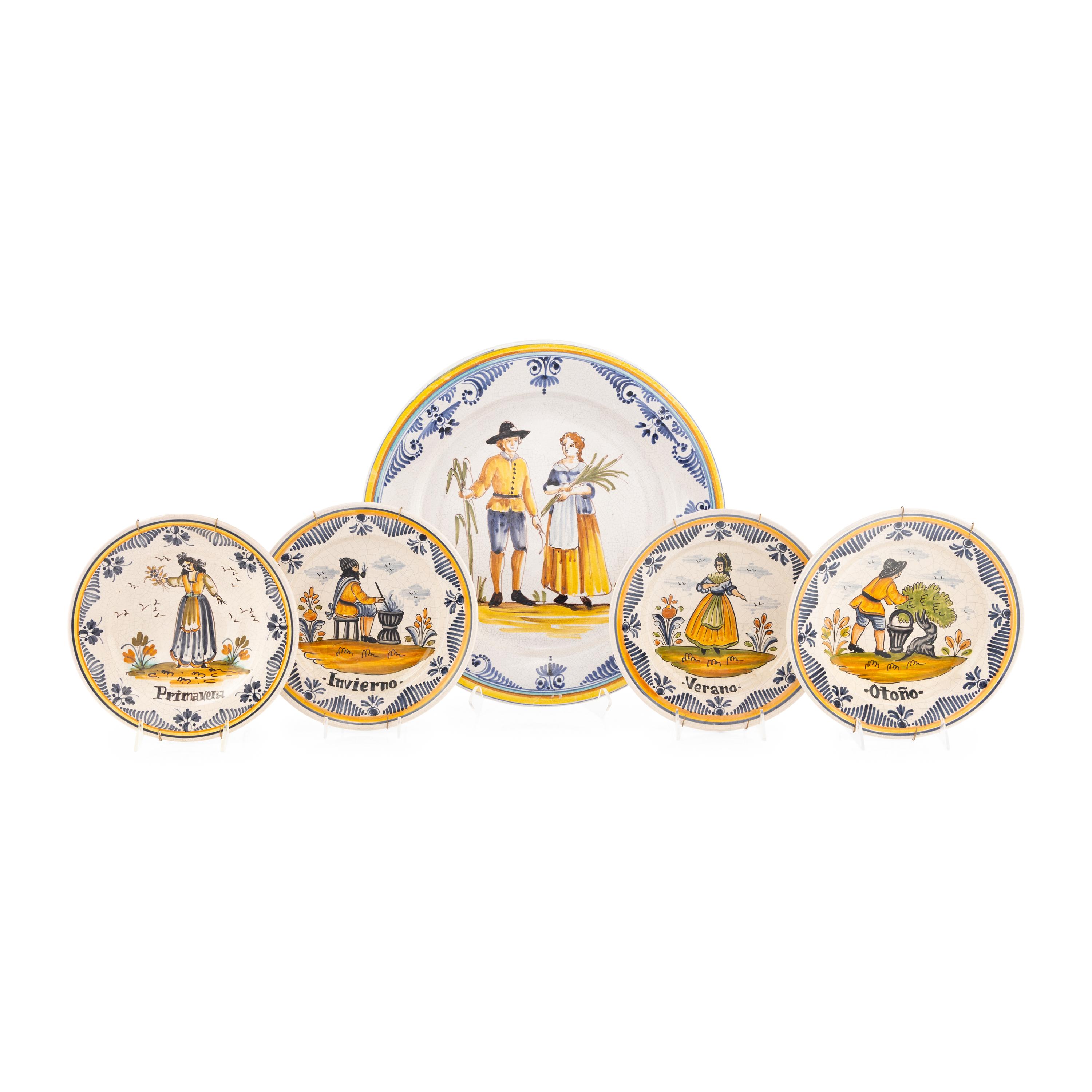 A Spanish Majolica Charger and Four Cabinet Plates