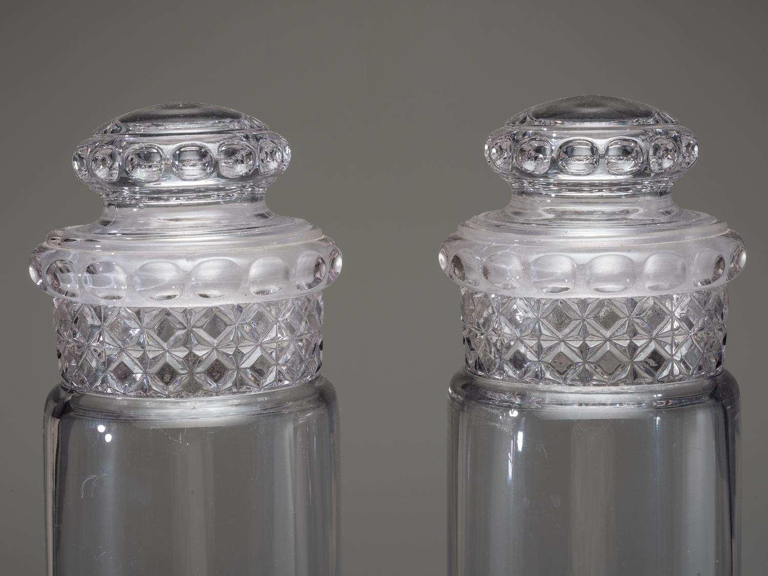 Eight Molded Glass Display Jars