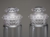Eight Molded Glass Display Jars