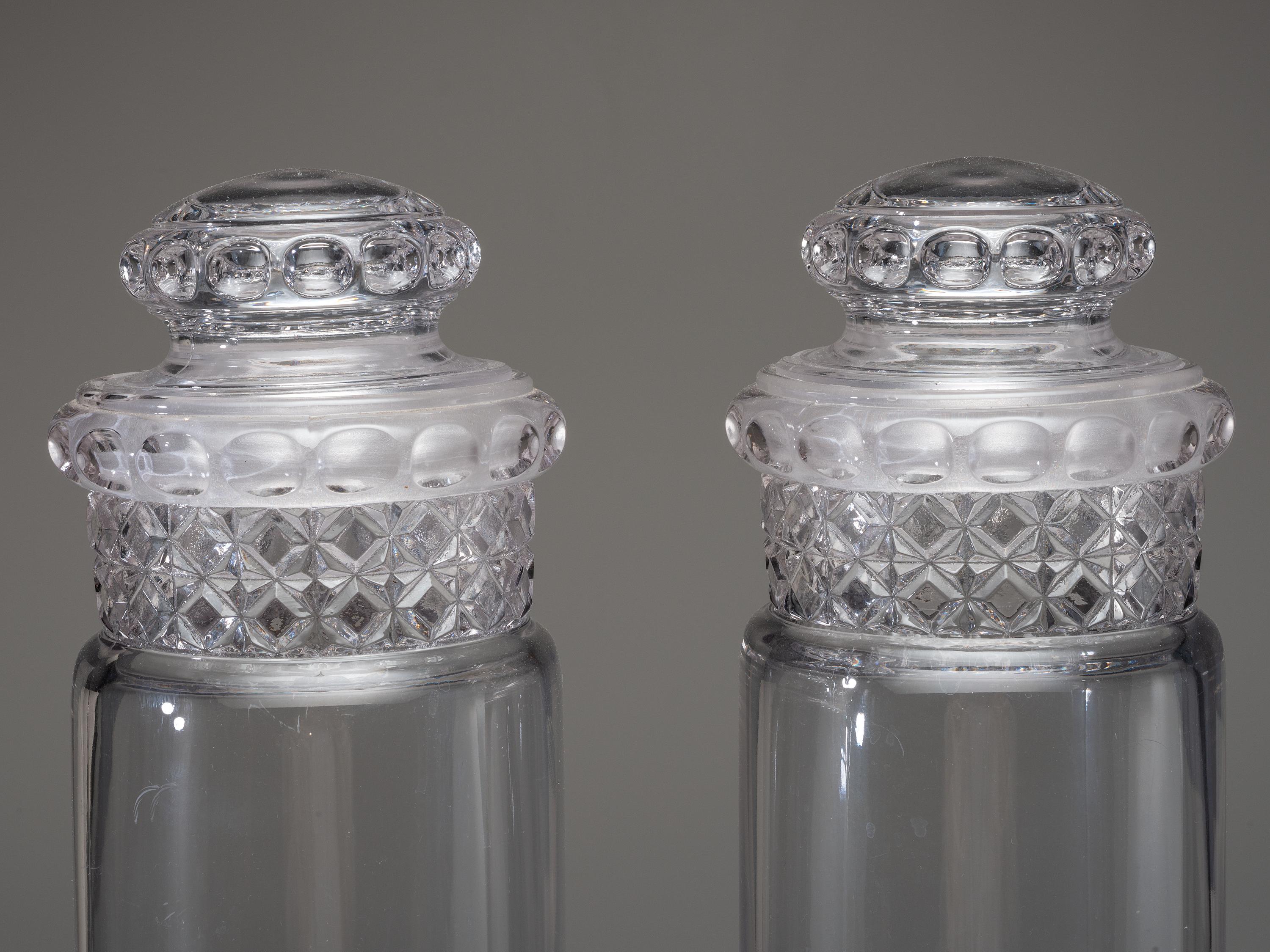 Eight Molded Glass Display Jars