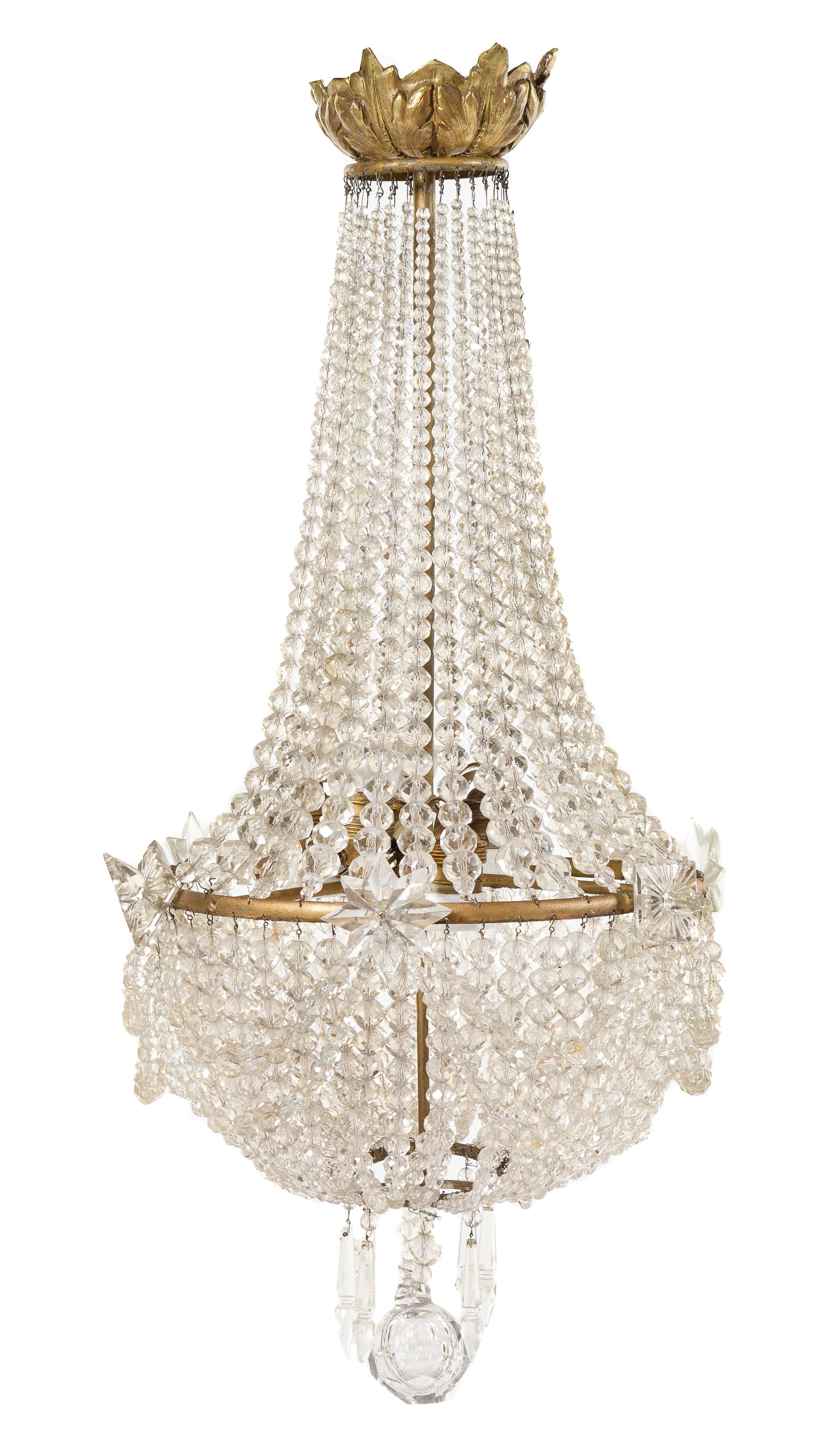 An Empire Style Gilt Metal Chandelier Height 33 x diameter 15 inches.