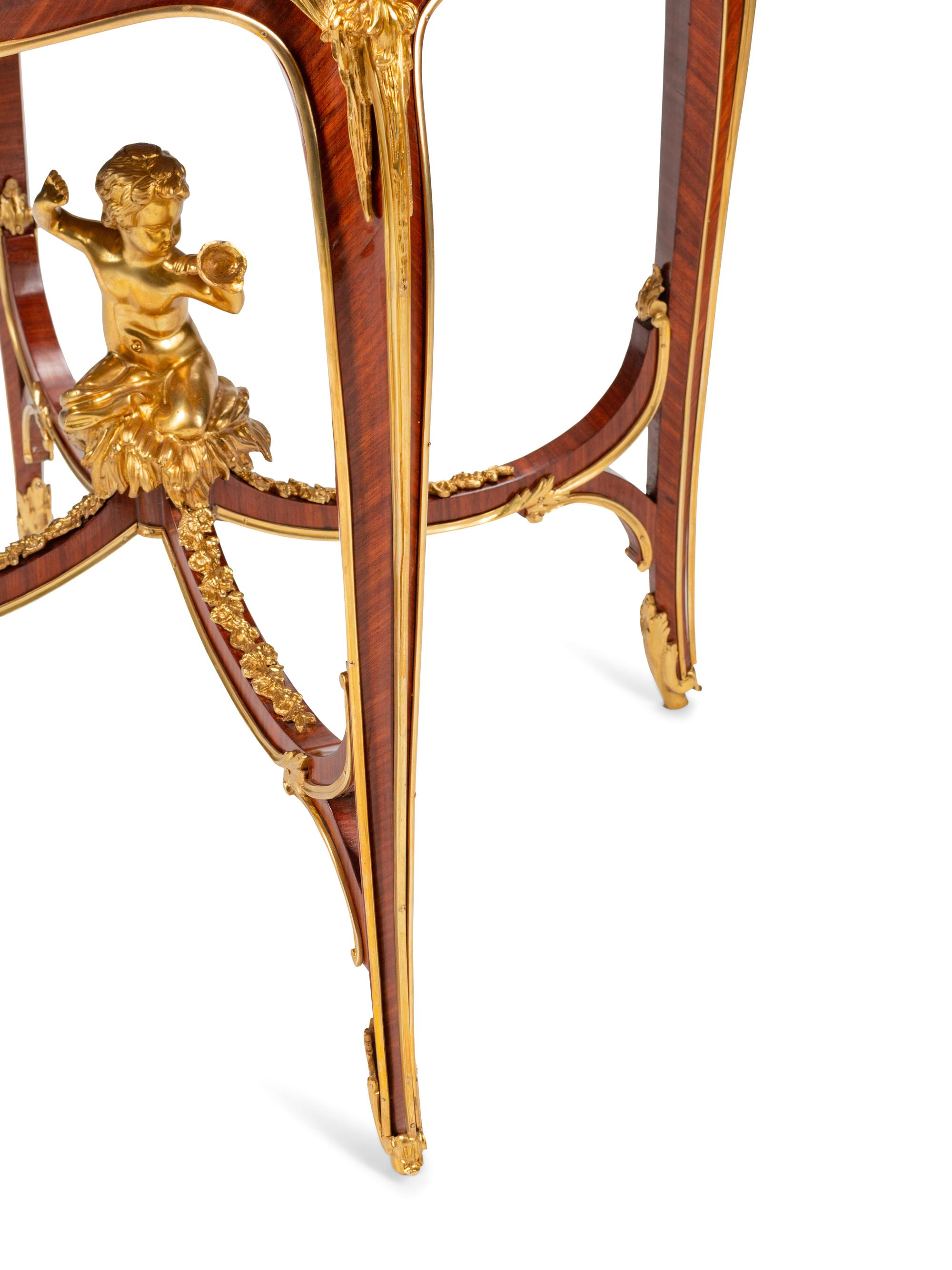 A Louis XV Style Gilt Bronze Mounted Marquetry Table