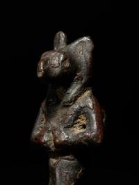 An Egyptian Stone Striding Bastet and an Egyptian Bronze Anubis