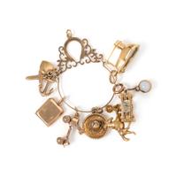 COLLECTION OF YELLOW GOLD CHARMS