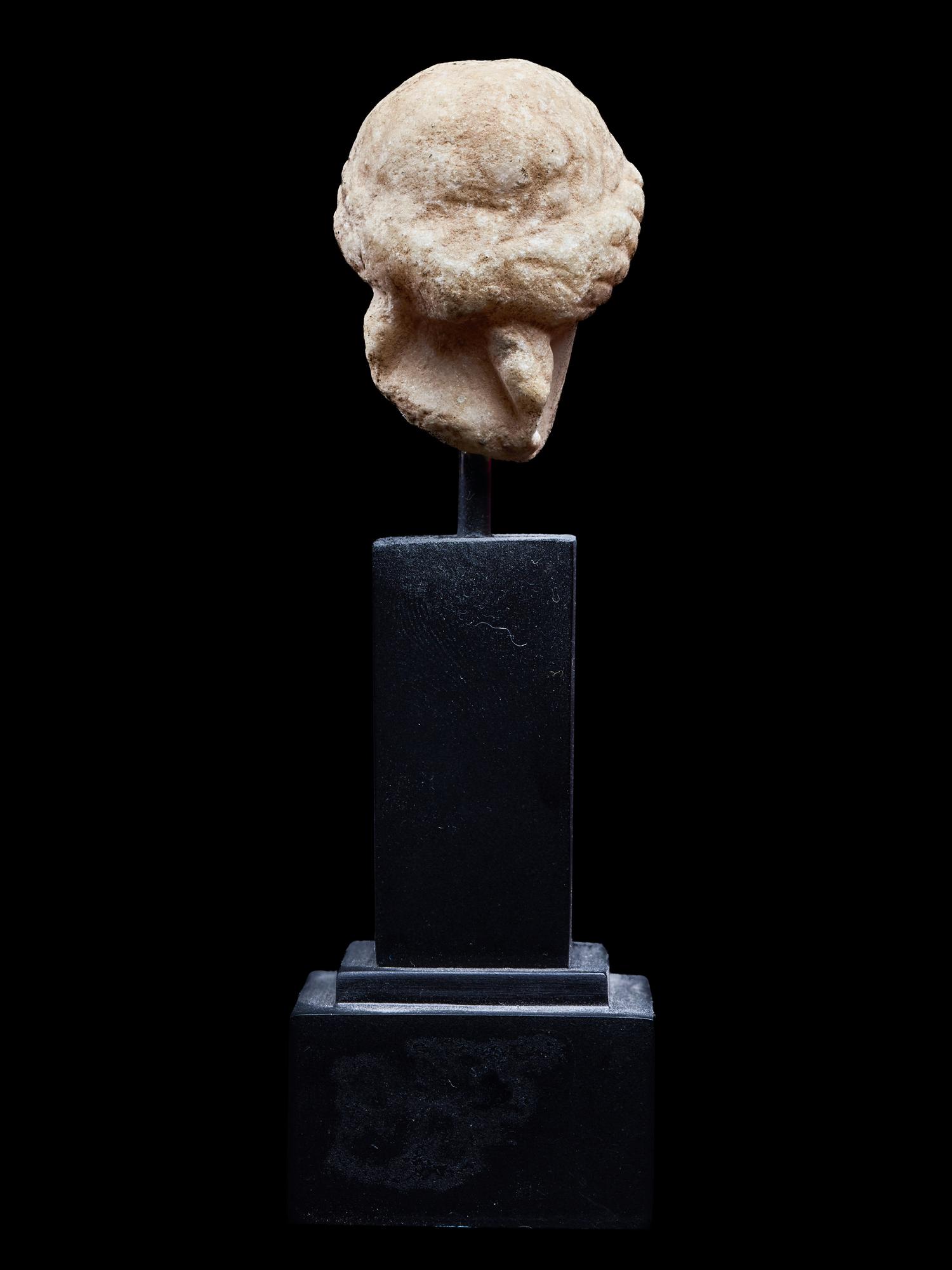 A Roman Marble Head of a Goddess