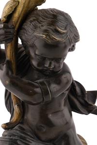 A Pair of French Gilt and Patinated Bronze Six-Light Candelabra