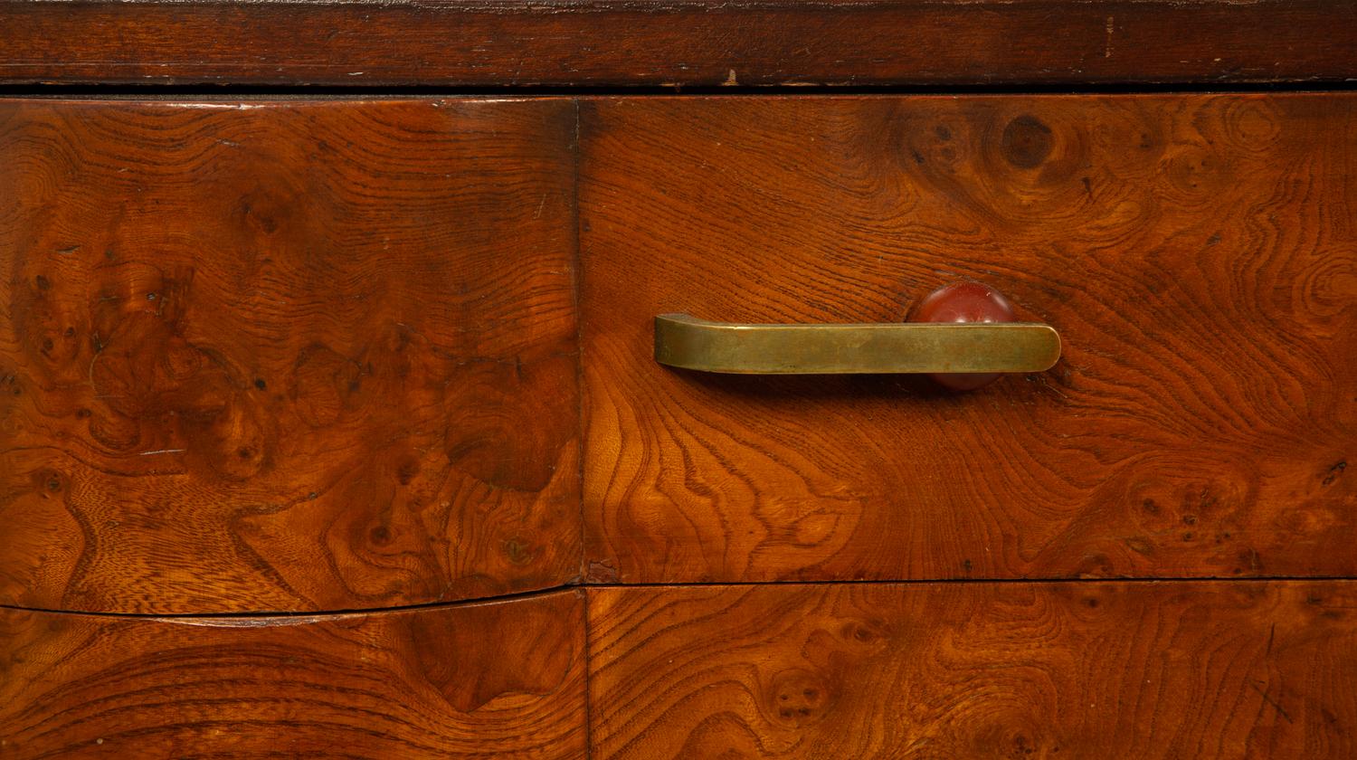 An Art Deco Walnut Chest of Drawers — CIRCA 1930