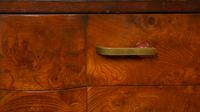 An Art Deco Walnut Chest of Drawers — CIRCA 1930