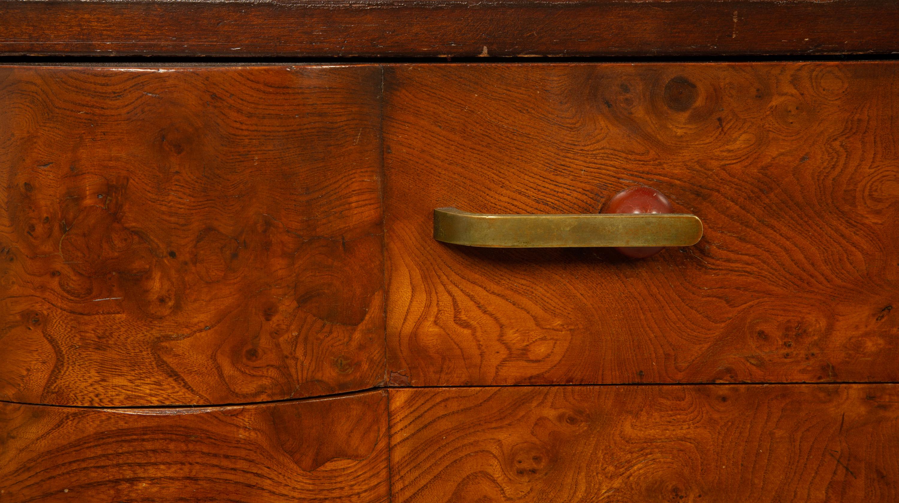 An Art Deco Walnut Chest of Drawers — CIRCA 1930