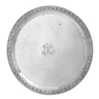 An American Silver Salver, Tiffany & Co., New York, NY, 1880, of circular form, with a foliate scroll border and a script monogram at t