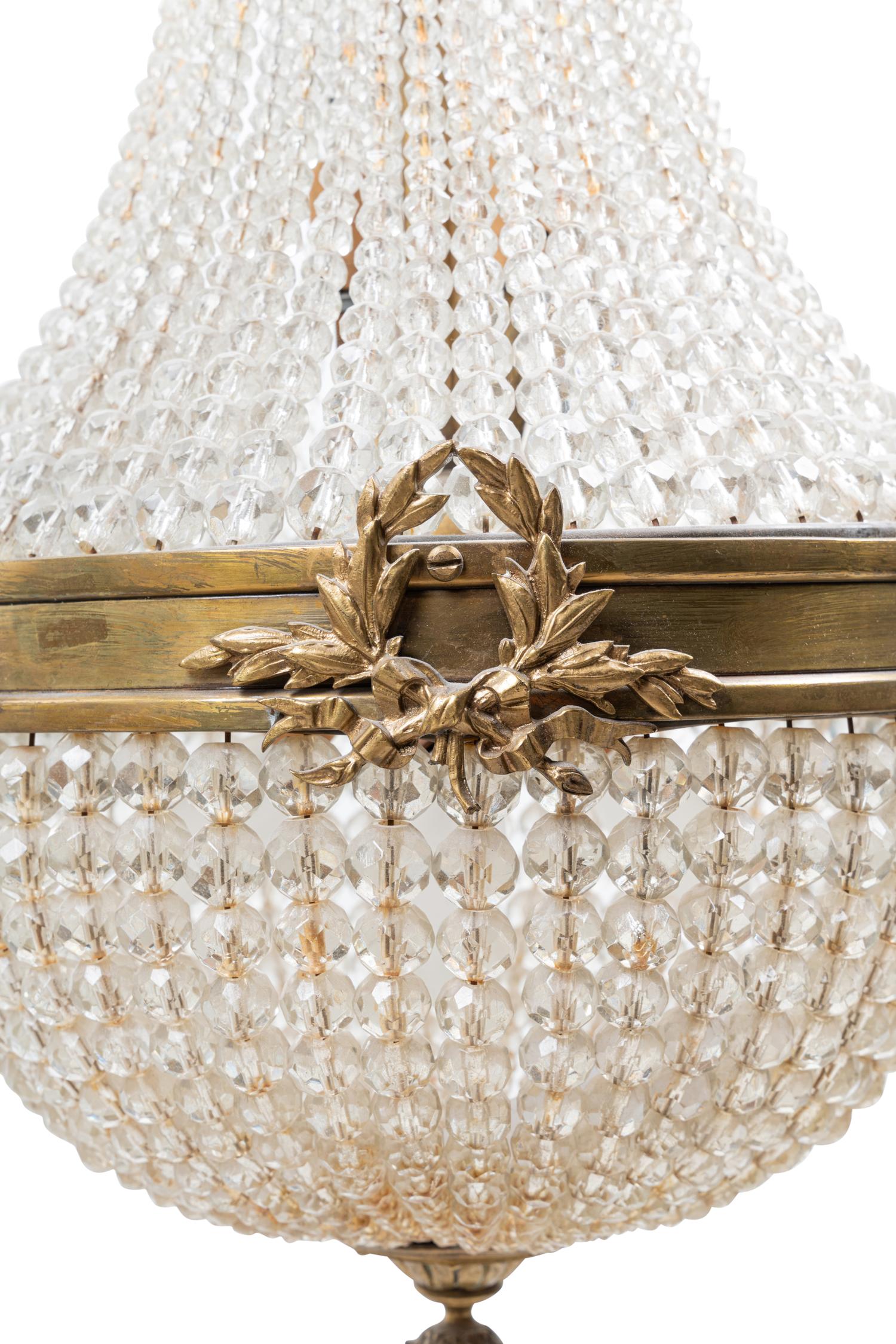 An Empire Style Gilt Metal and Beaded Glass Chandelier