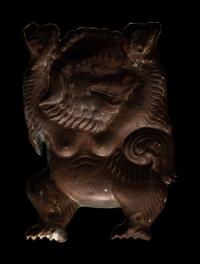 A Sino-Tibetan Gilt Bronze Repoussé Fu-Lion