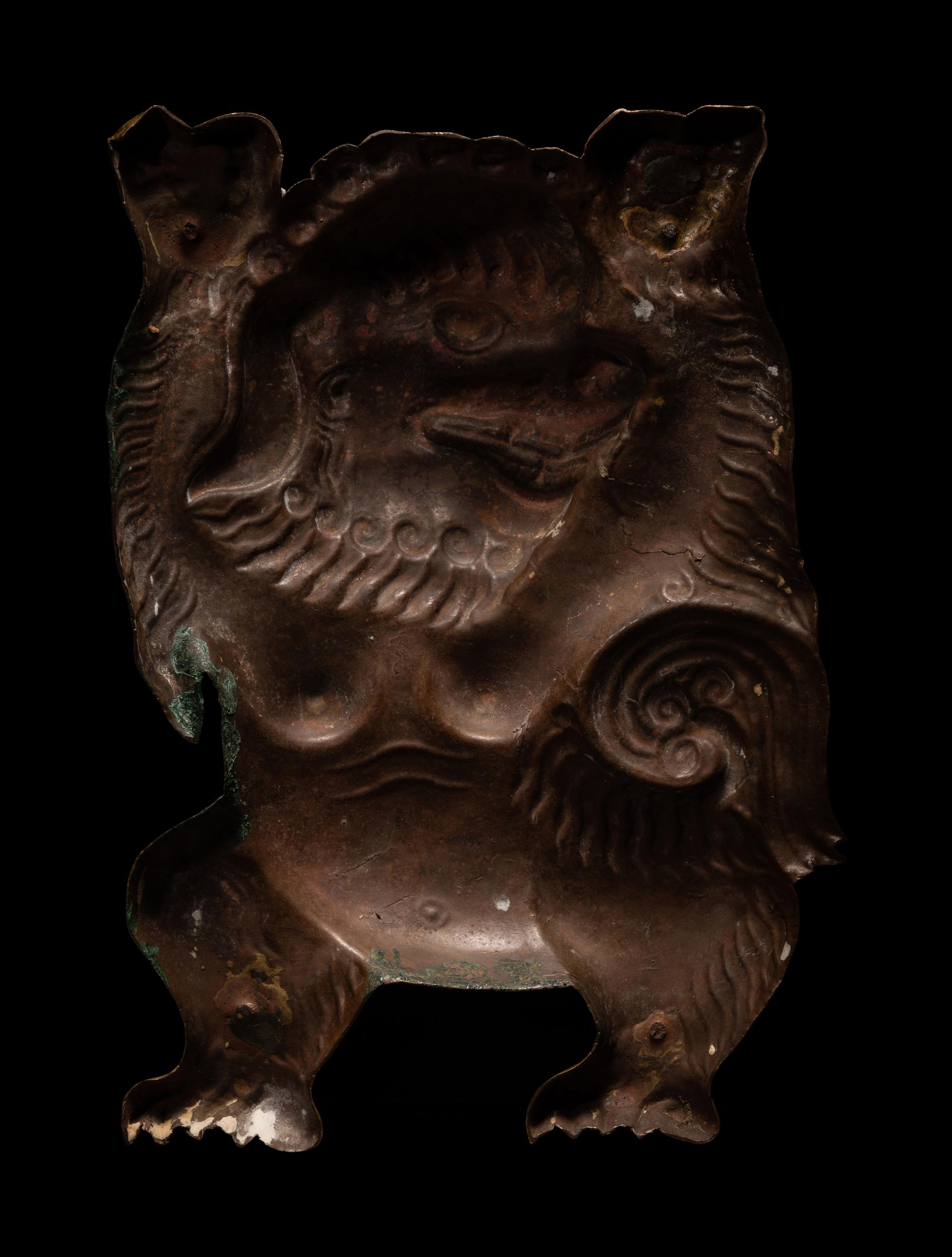 A Sino-Tibetan Gilt Bronze Repoussé Fu-Lion