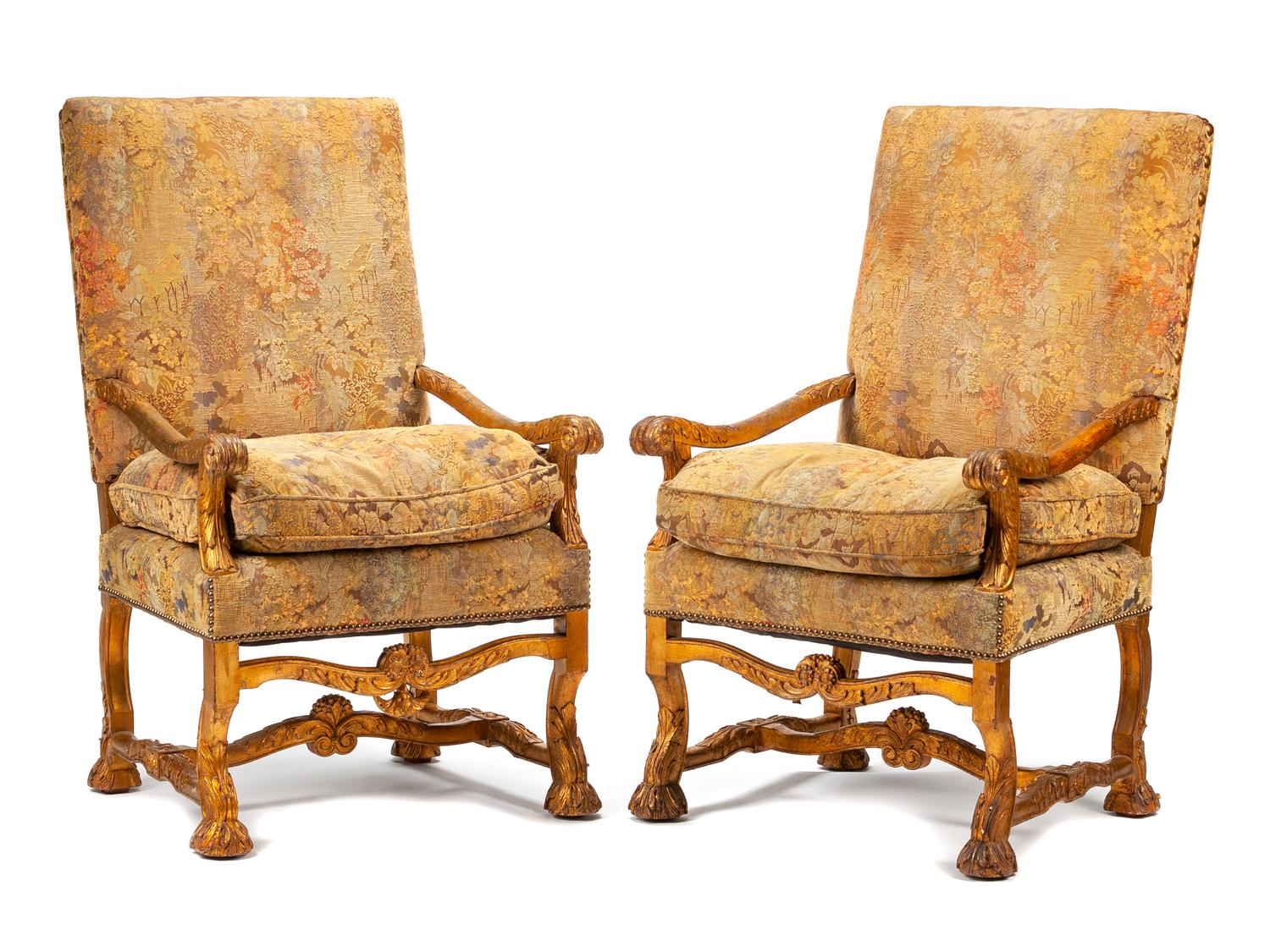 A Pair of French Renaissance Revival Carved Giltwood Armchairs