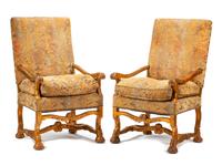 A Pair of French Renaissance Revival Carved Giltwood Armchairs