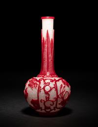 A Chinese Red Overlay Snowflake Ground Peking Glass Bottle Vase