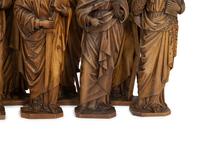 A Set of Twelve Continental Carved Walnut Figures of Apostles