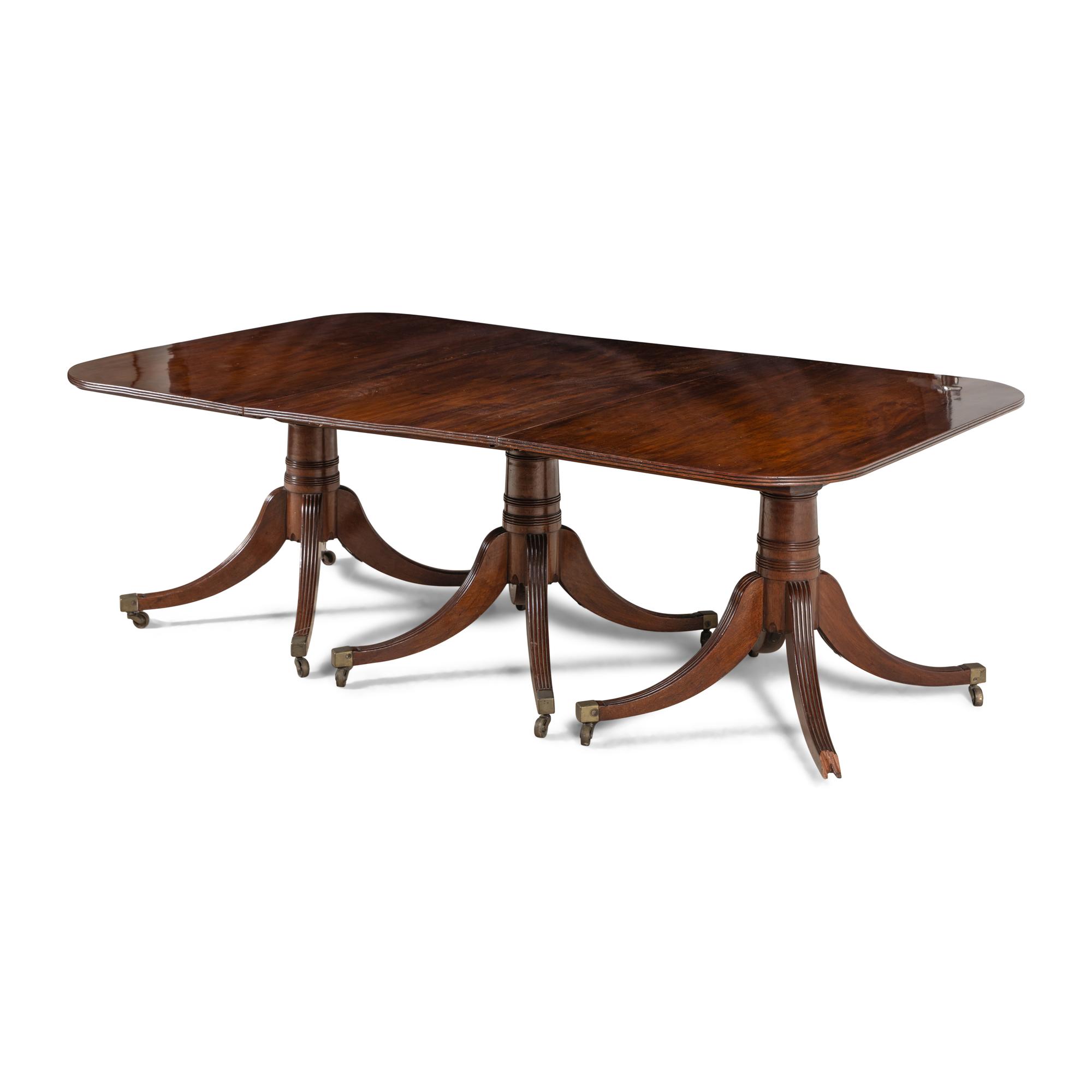 A Late George III Mahogany Triple Pedestal Dining Table