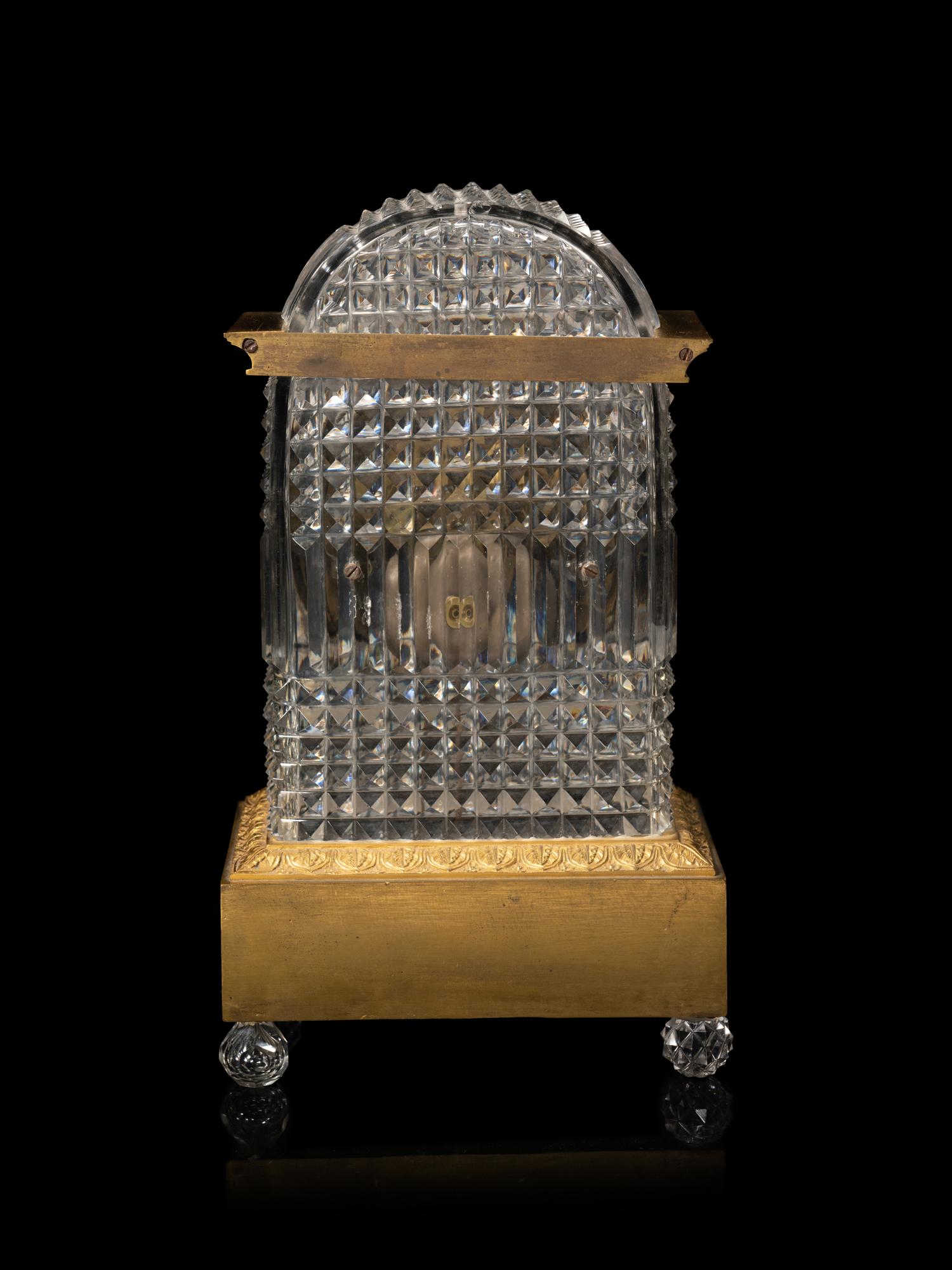 A Charles X Gilt Bronze and Cut Glass Mantel Clock
