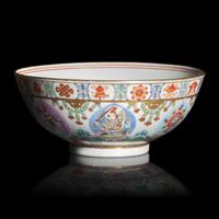 A Chinese Famille Rose Porcelain Bowl with 'Baragon Tumed' Marks in Mongolian Script, Daoguang Period — 清道光 粉彩七政寳紋碗 礬紅蒙文款