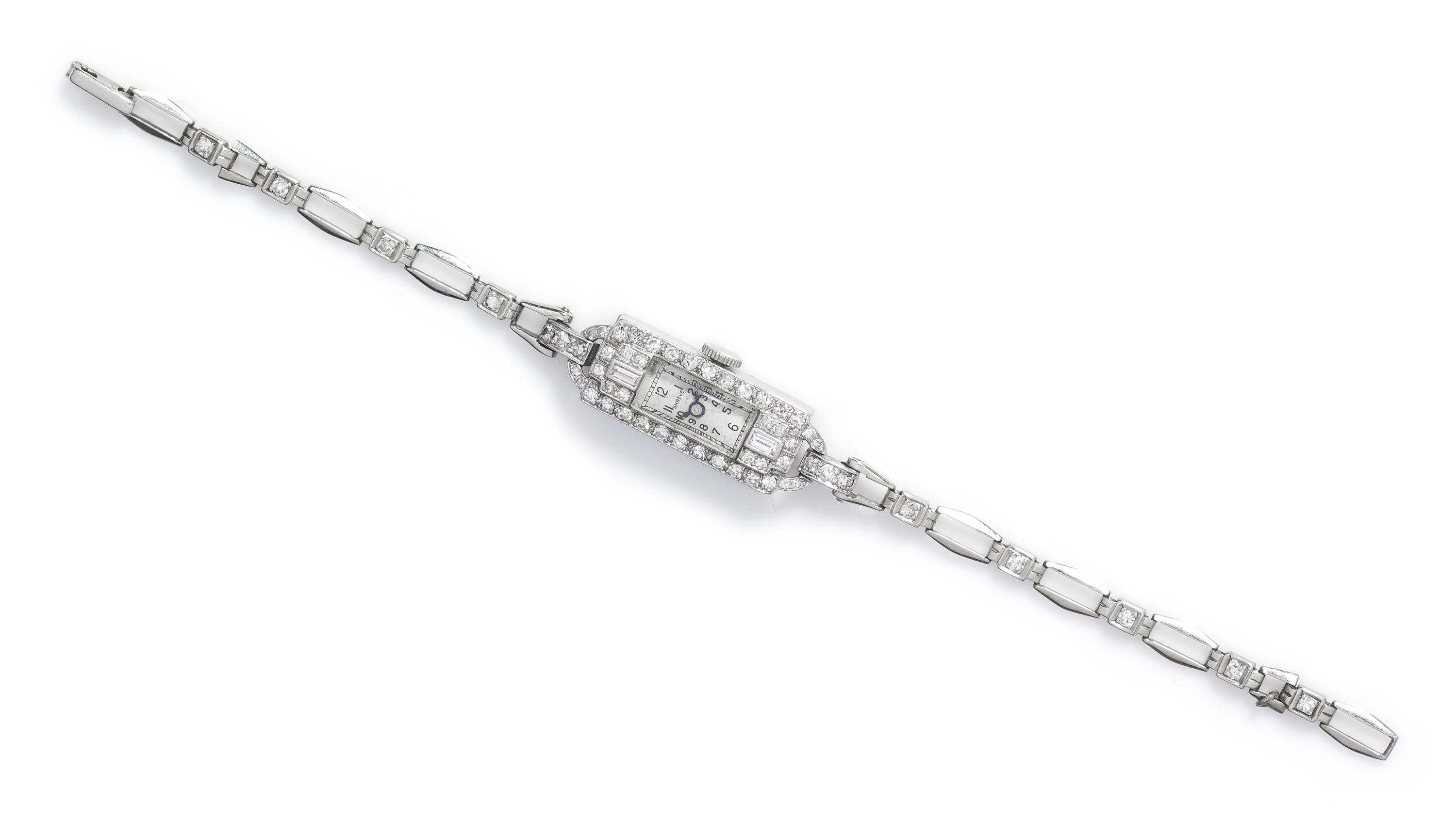 A Platinum, White Gold and Diamond Wristwatch, Shreve, 8.60 dwts.