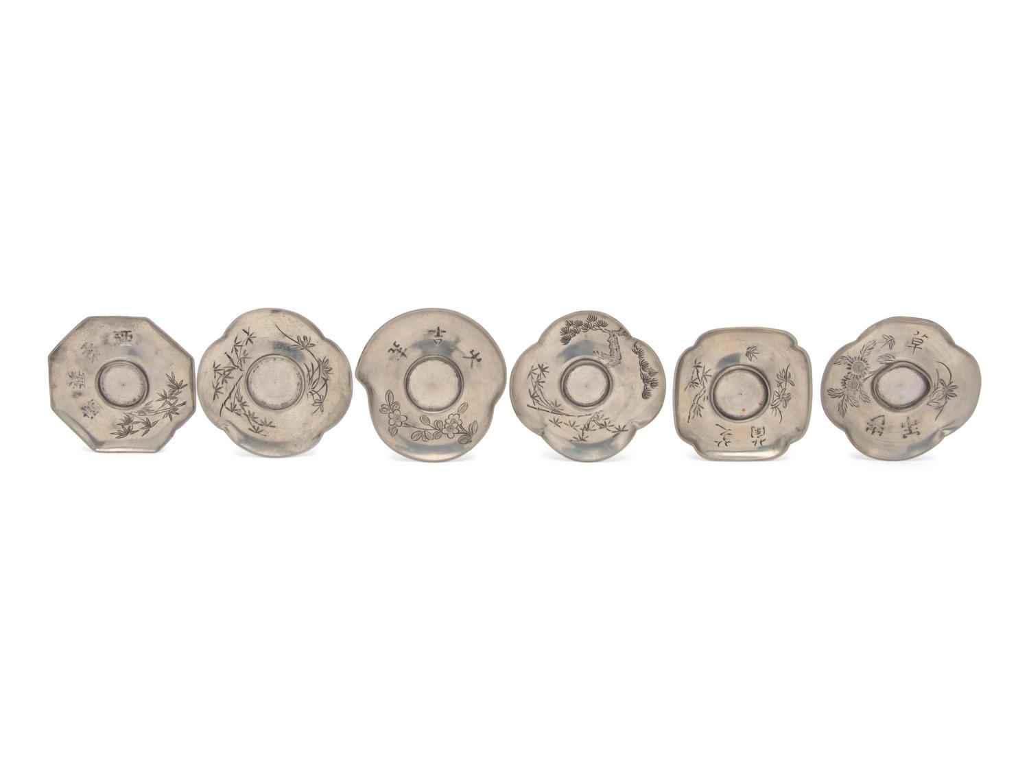 A Set of Six Chinese Pewter Cup Stands