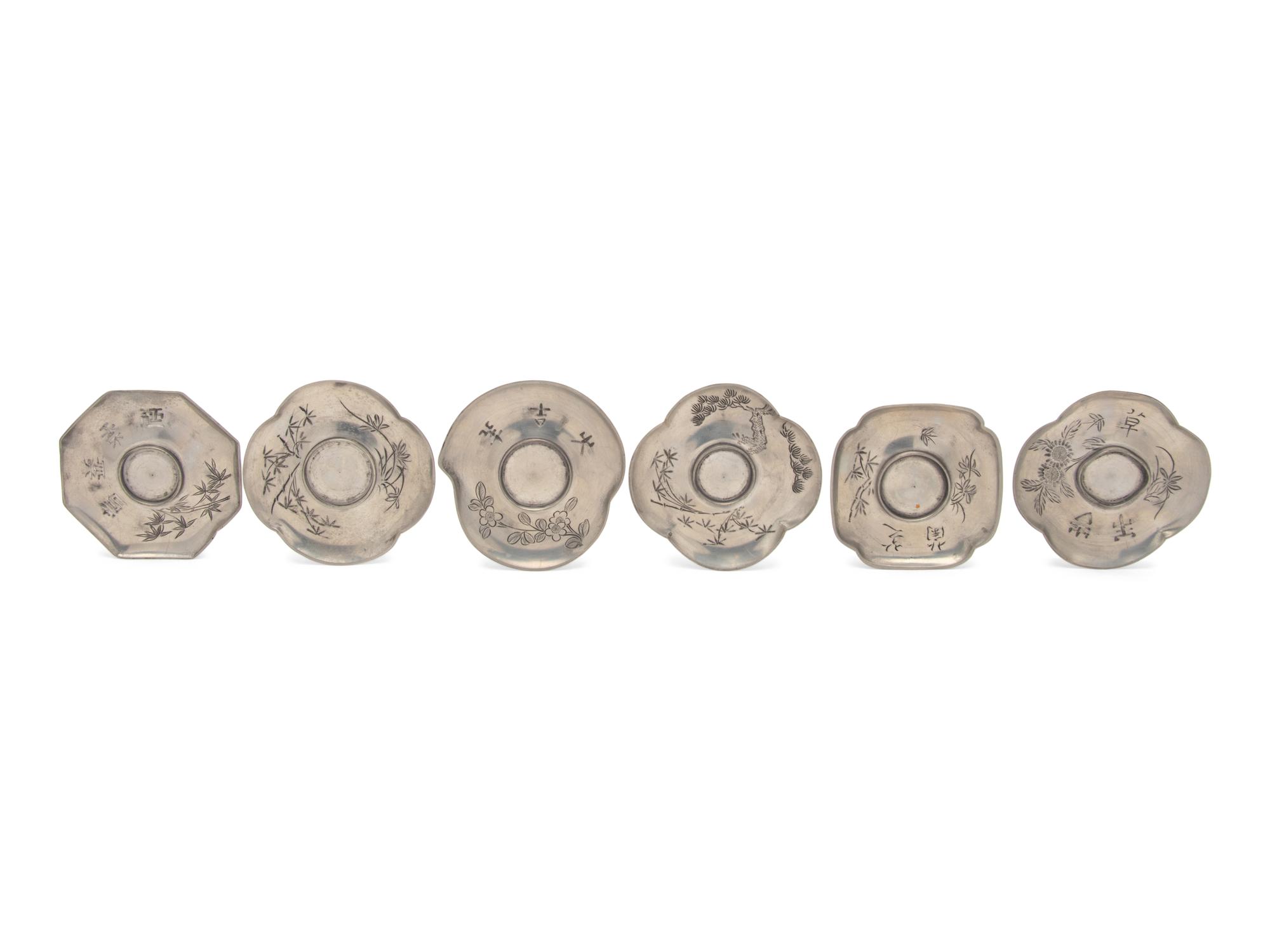 A Set of Six Chinese Pewter Cup Stands