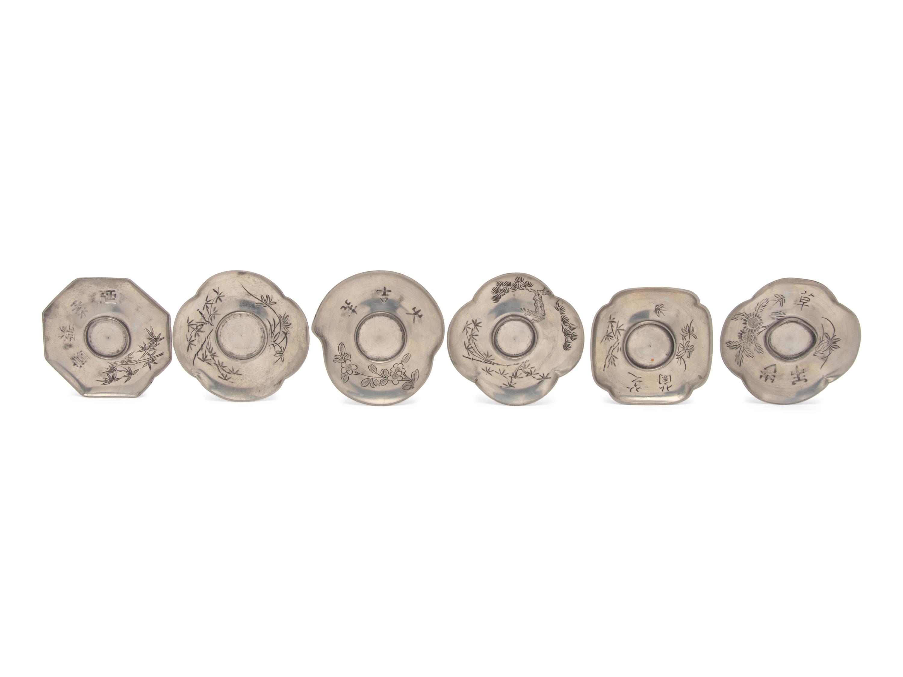 A Set of Six Chinese Pewter Cup Stands