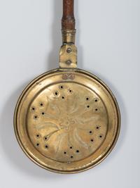 An English Engraved and Pierced Brass Bed Warmer