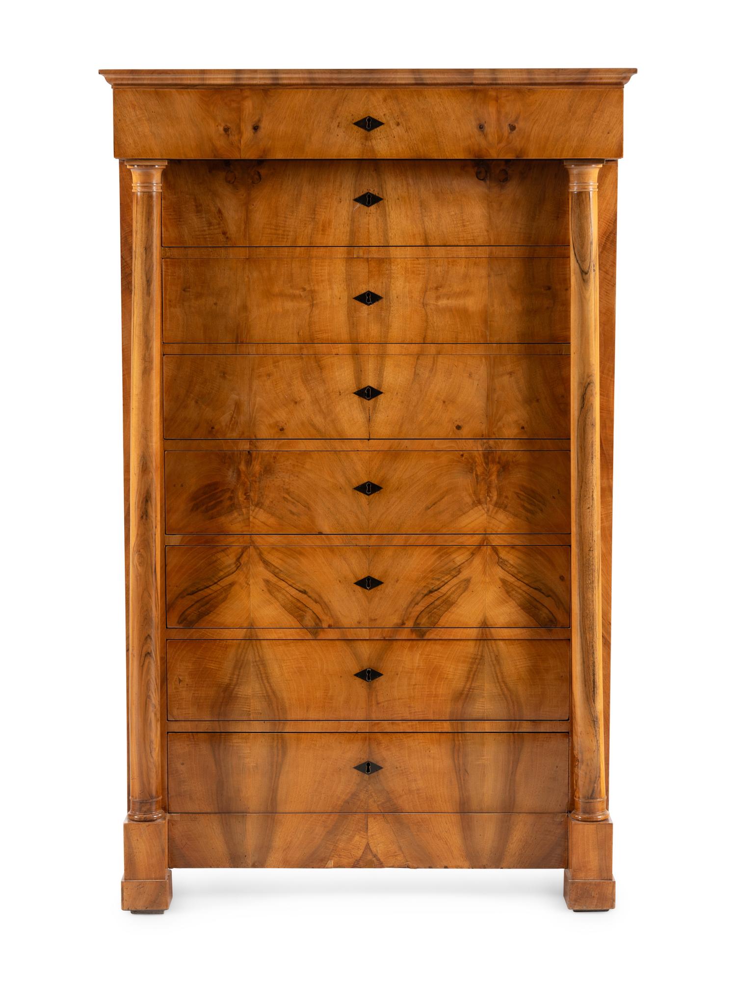 A Biedermeier Walnut Chiffonier