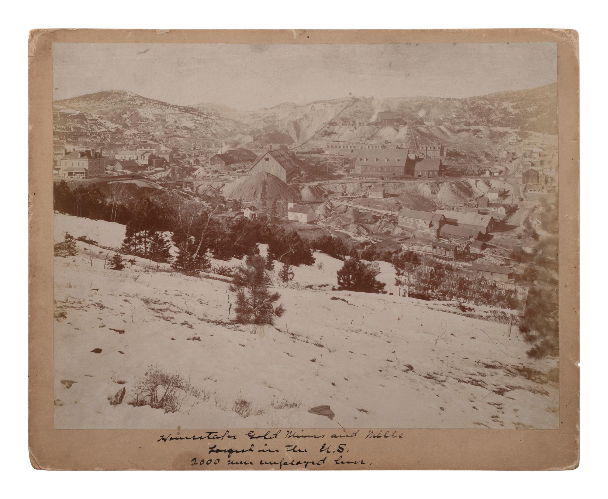 [WESTERN AMERICANA]. MCBRIDE, C.C., photographer. The Homestake gold mines and mills at Lead City, SD, on the B & M Railroad in the Black Hills . Crawford, NE, ca 1890s.