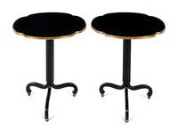 A Pair of Baker Ebonized and Parcel Gilt End Tables