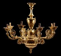 A Regence Style Gilt Bronze Eight-Light Chandelier Height 40 x diameter 44 inches.