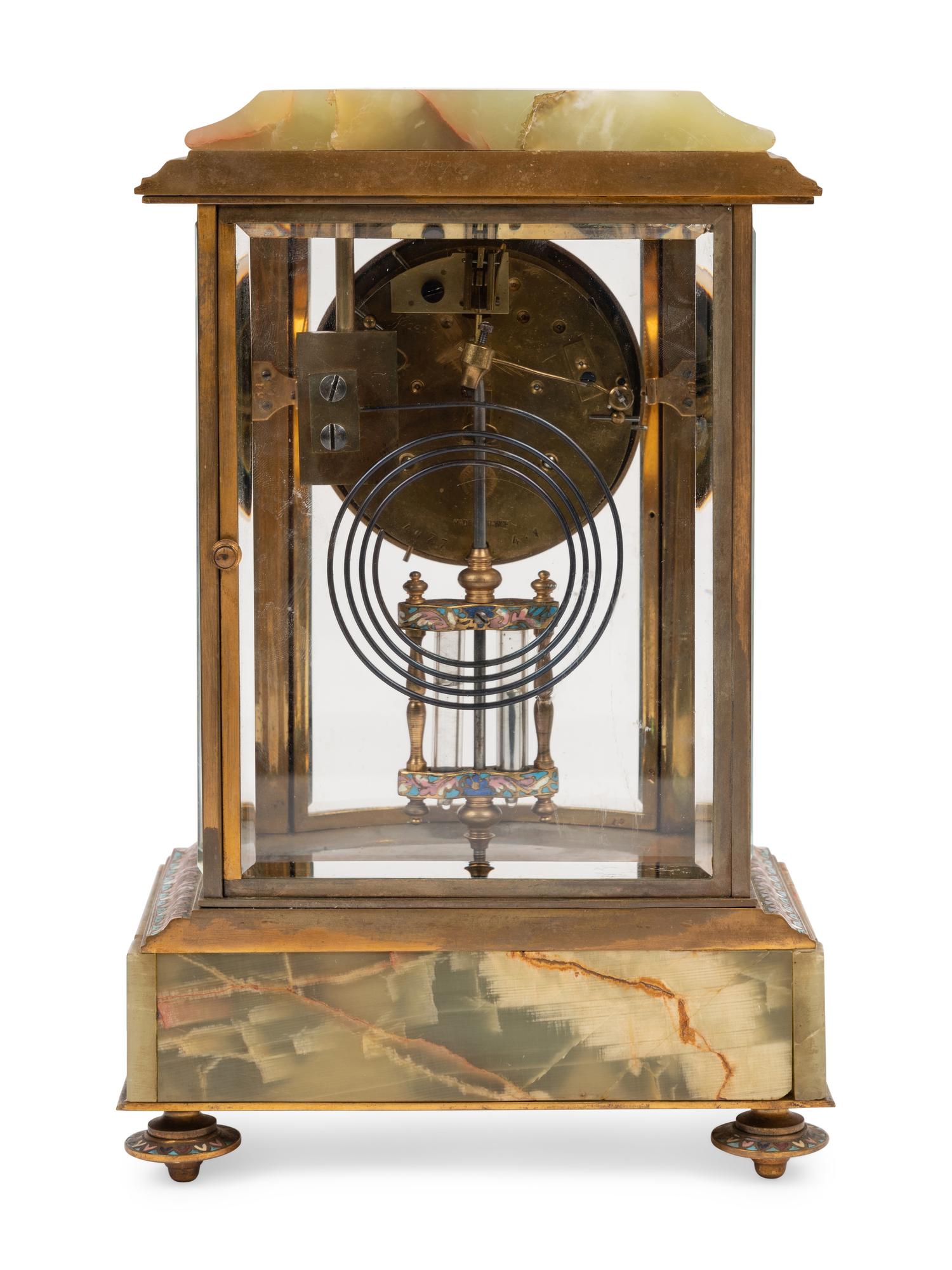 A French Onyx and Champlevé Mantel Clock
