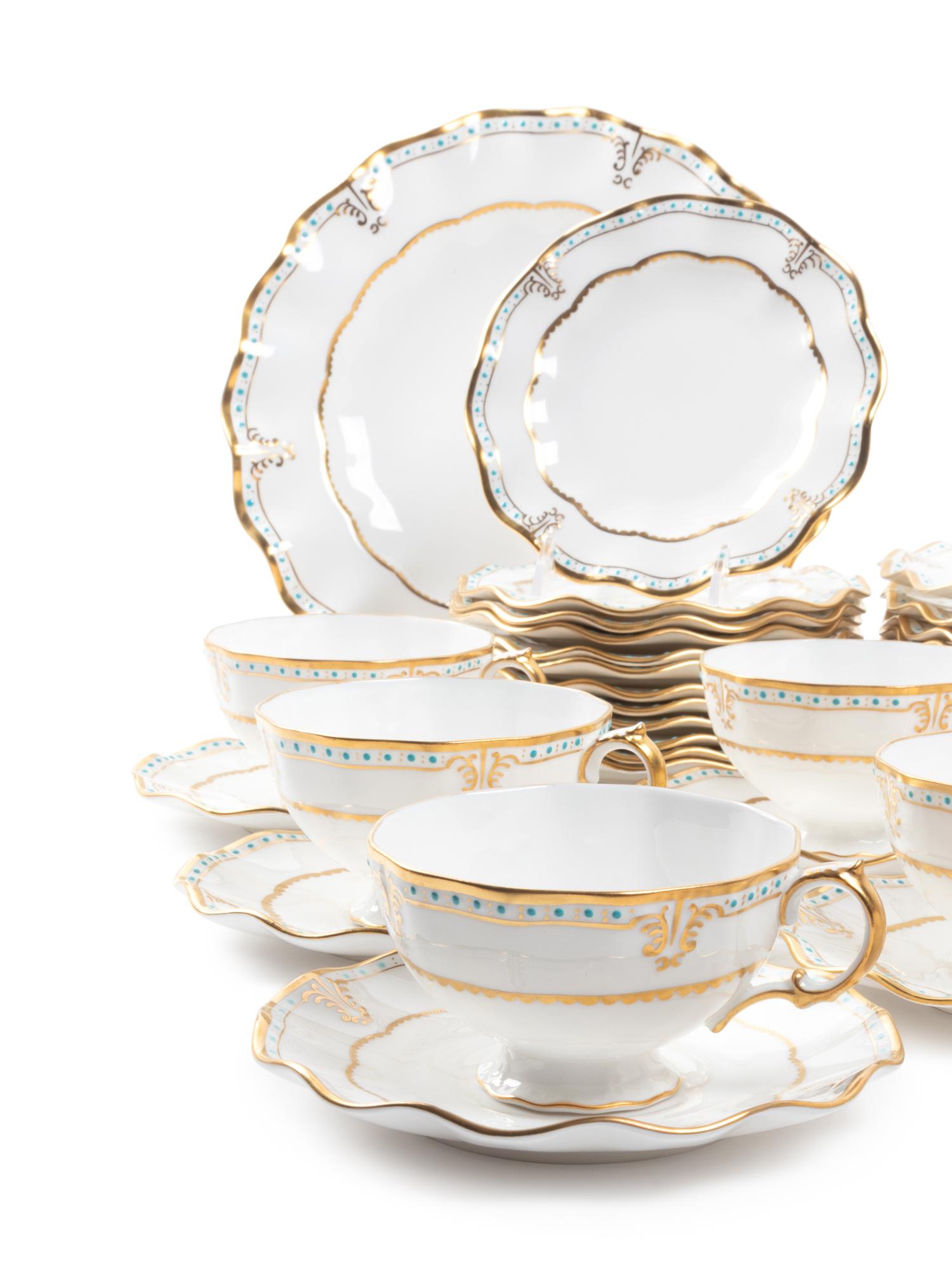 A Royal Crown Derby Porcelain Dinnerware Service for Twelve