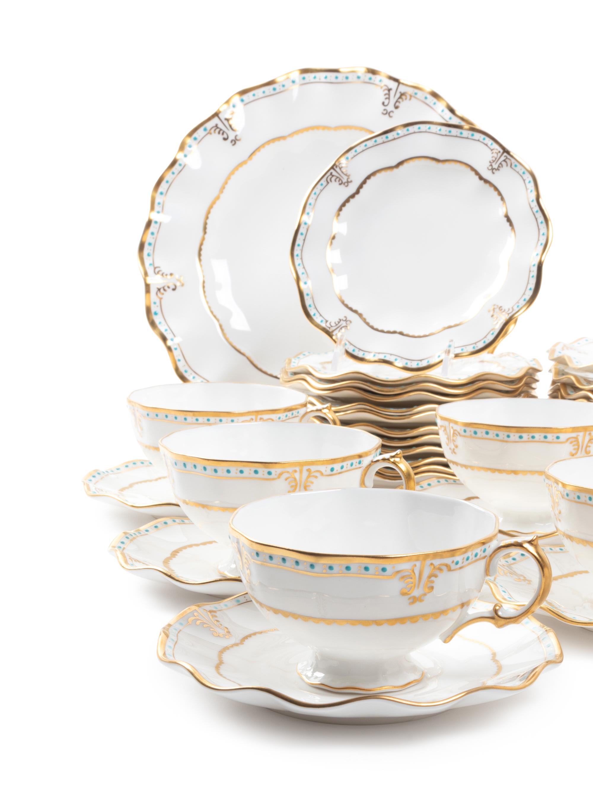 A Royal Crown Derby Porcelain Dinnerware Service for Twelve
