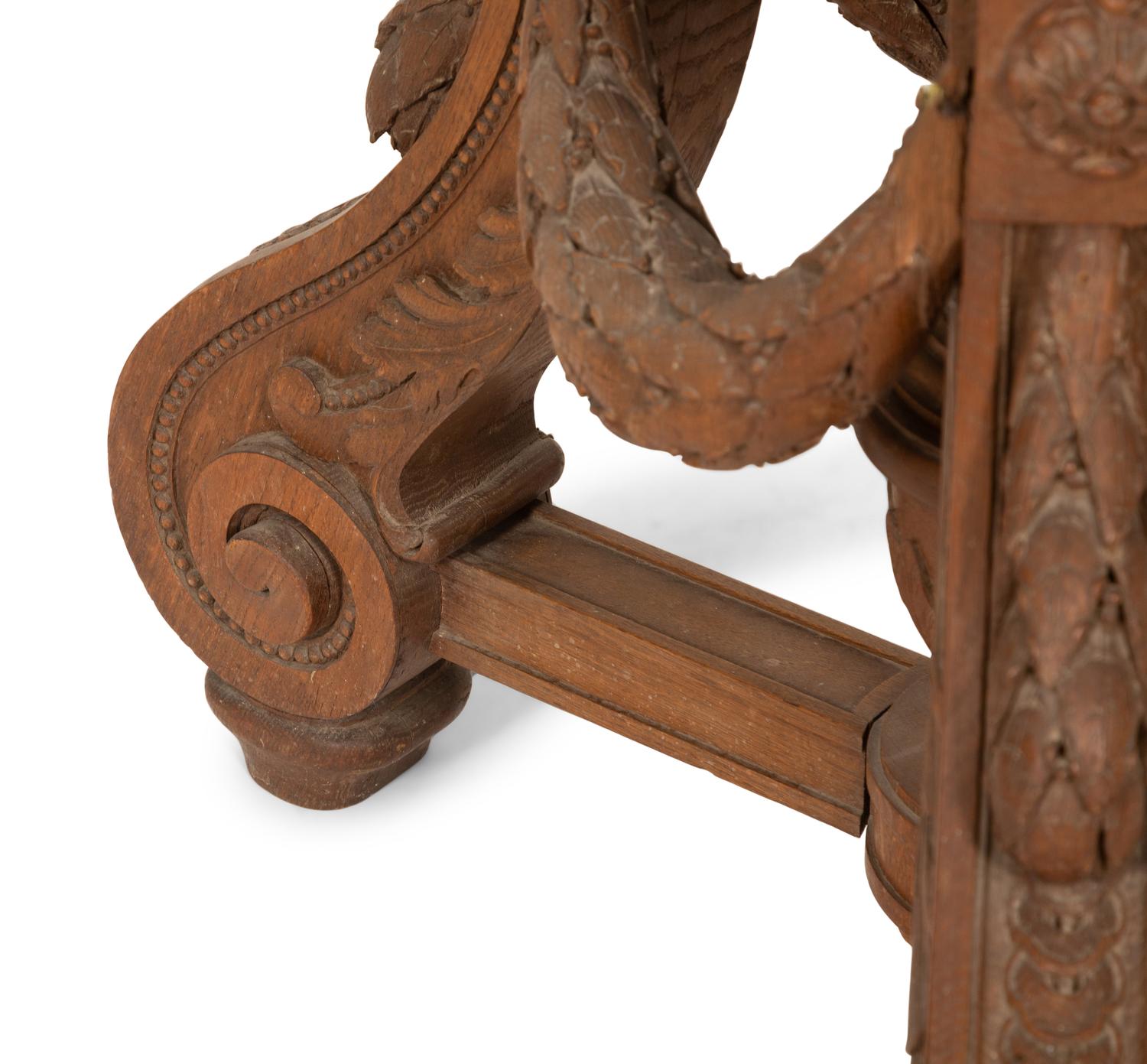 An Italian Carved Walnut Tripod Pedestal Table