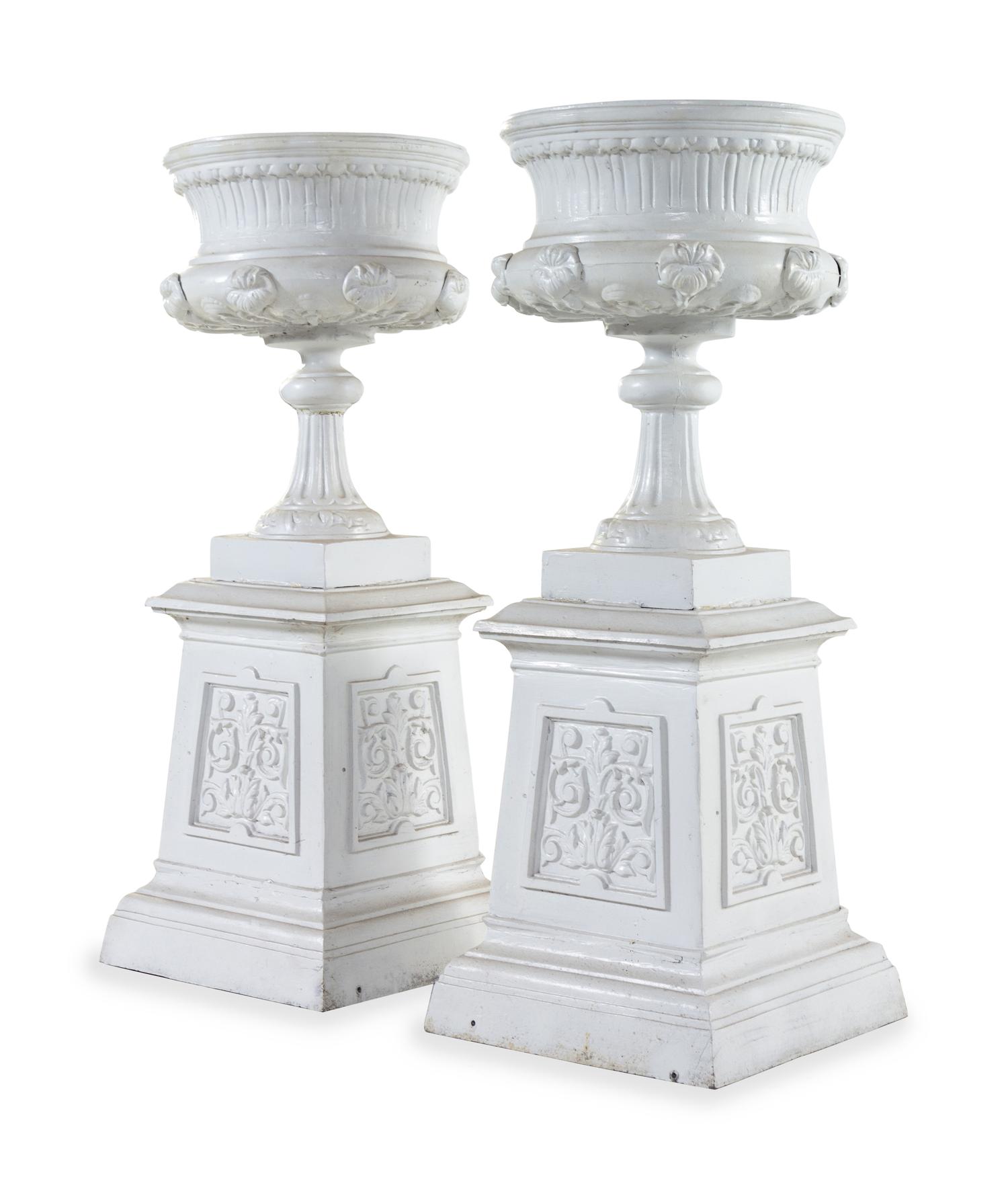 A Pair of Painted Iron Garden Urns
