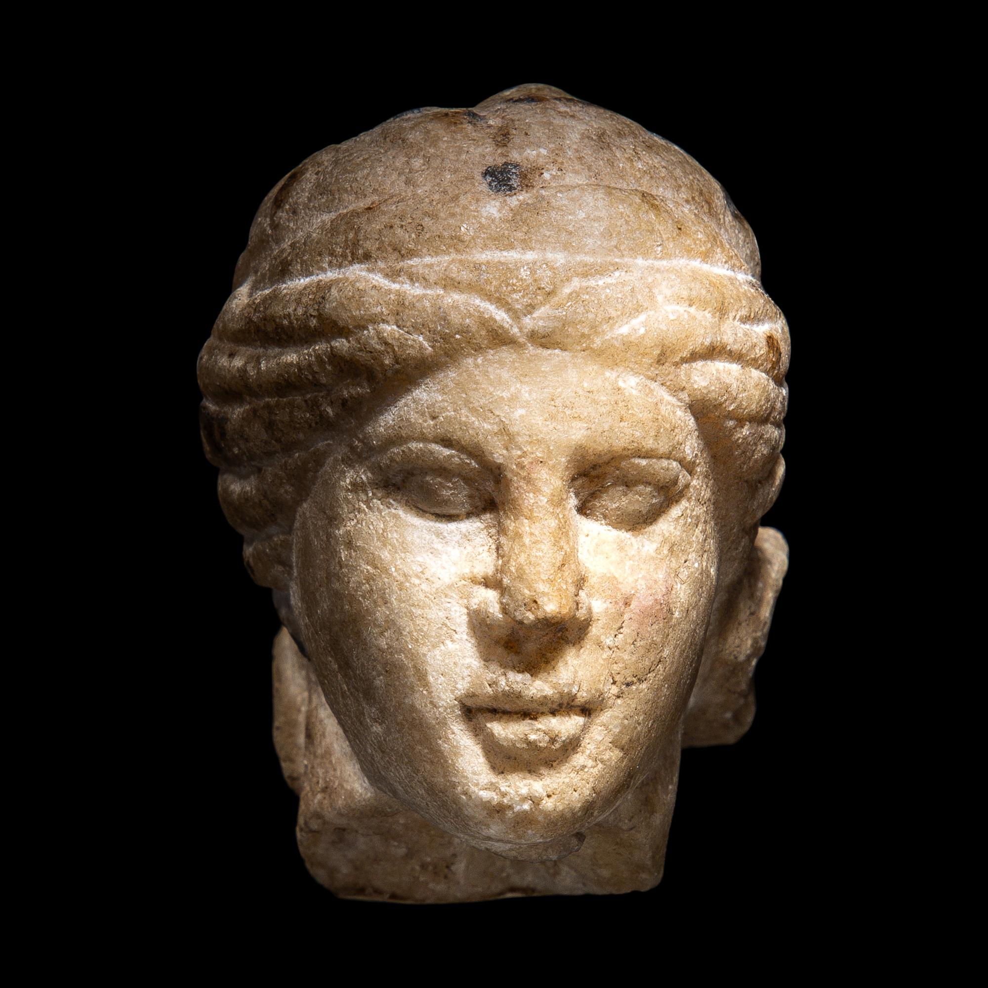 A Roman Marble Head of a Woman