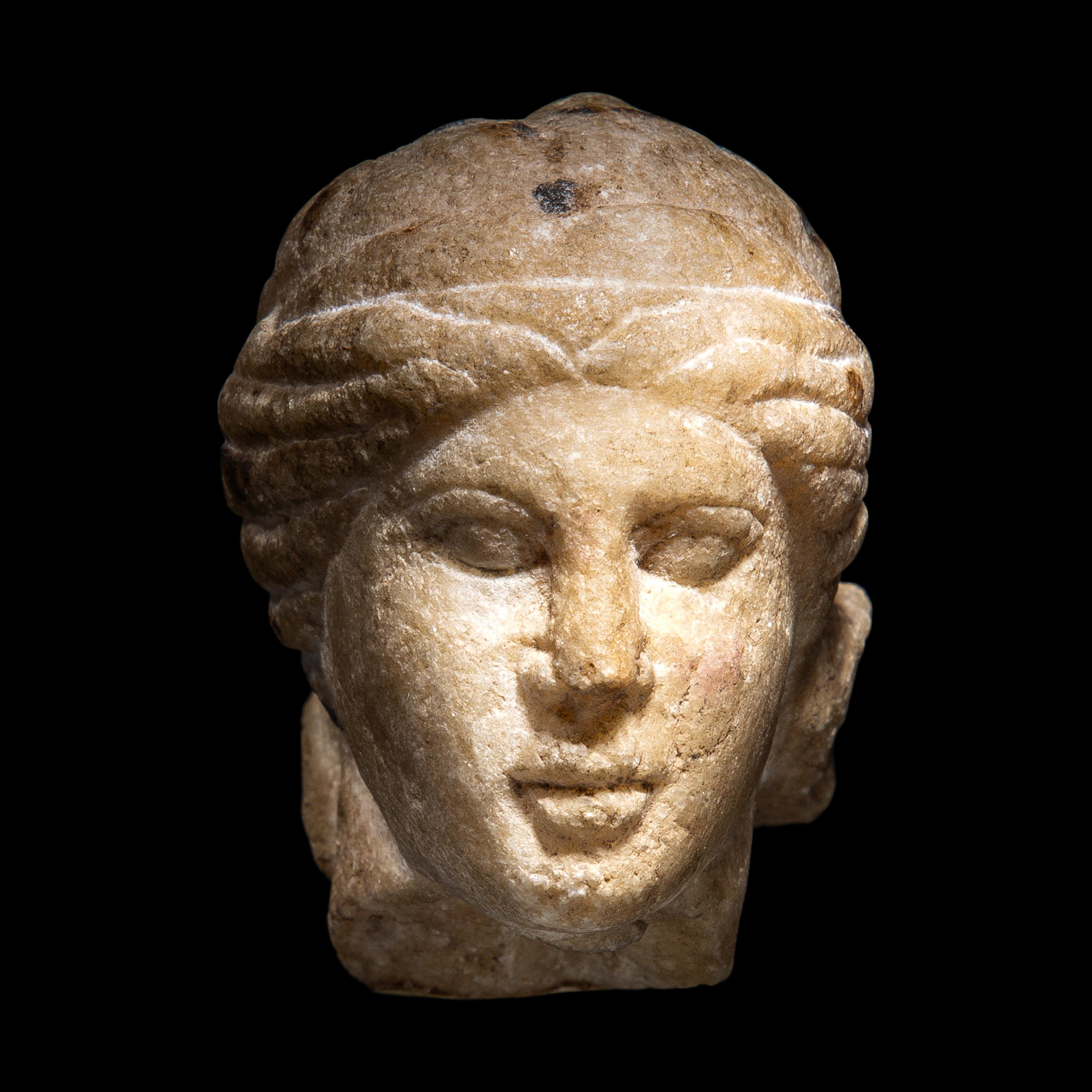 A Roman Marble Head of a Woman