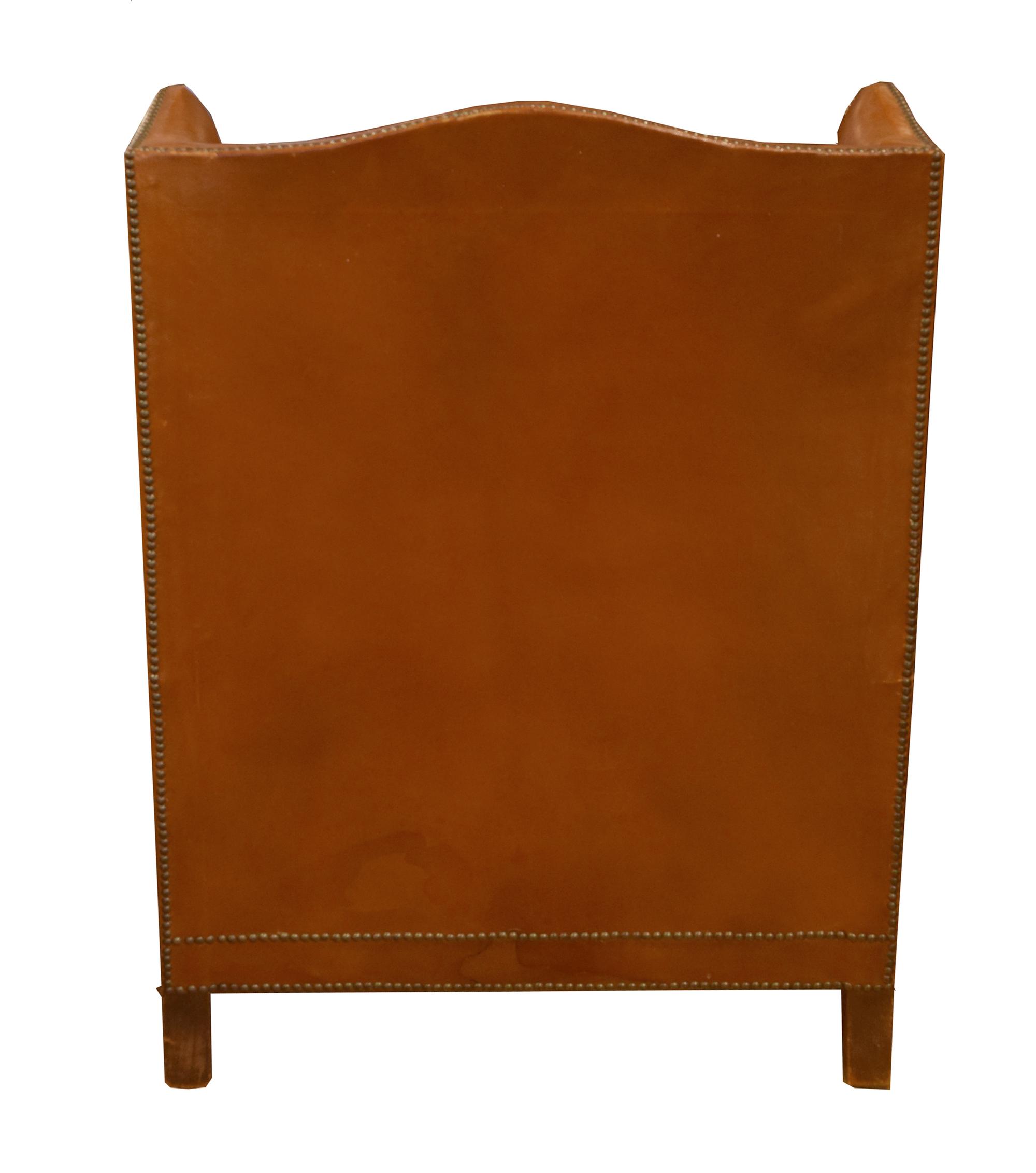A Leather Upholstered Wingback Chair 34.5" W x 30" D x 41" H — Italy, Circa 1910