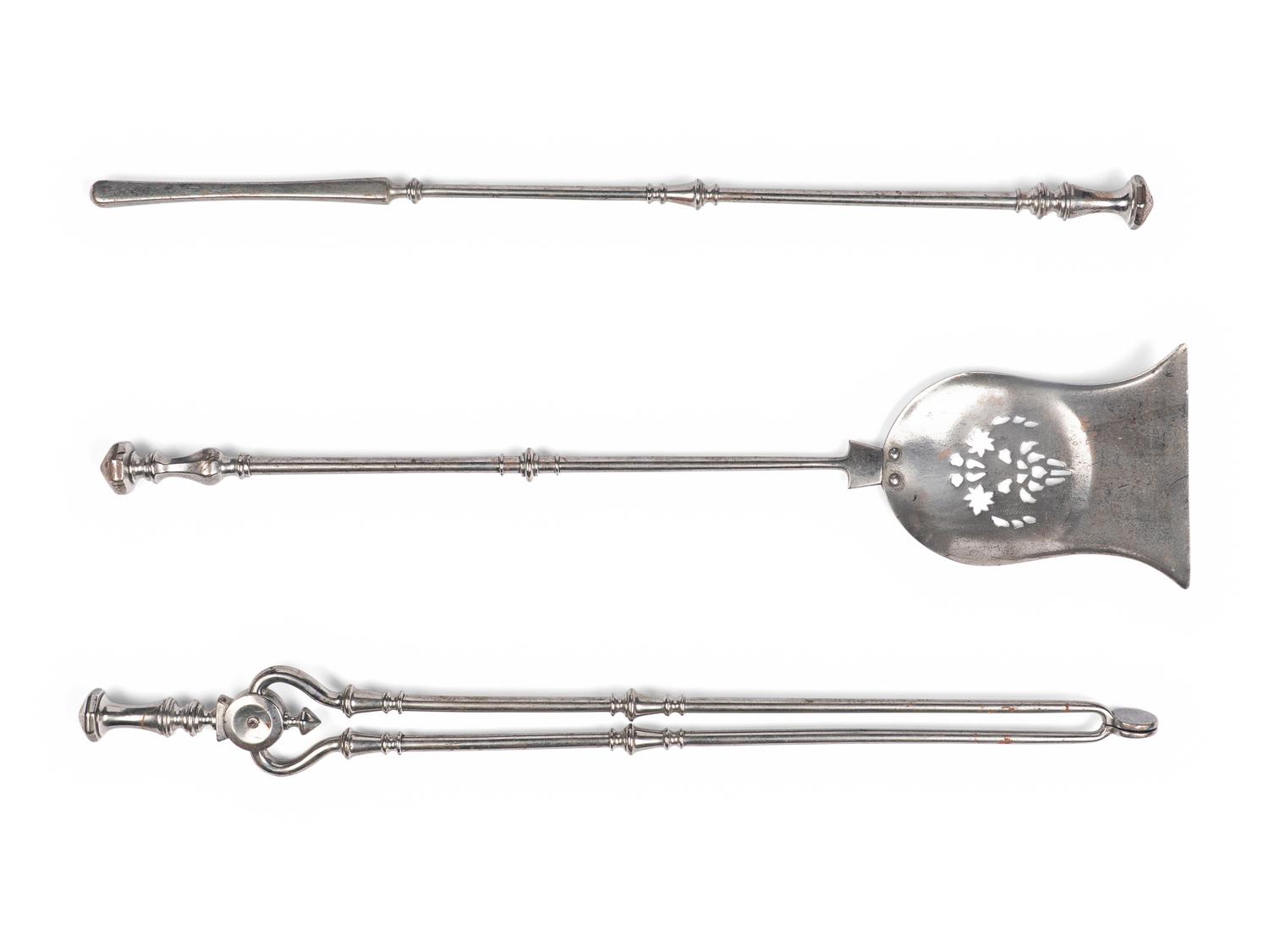 An English Brass Fireplace Fender and Pair of Andirons