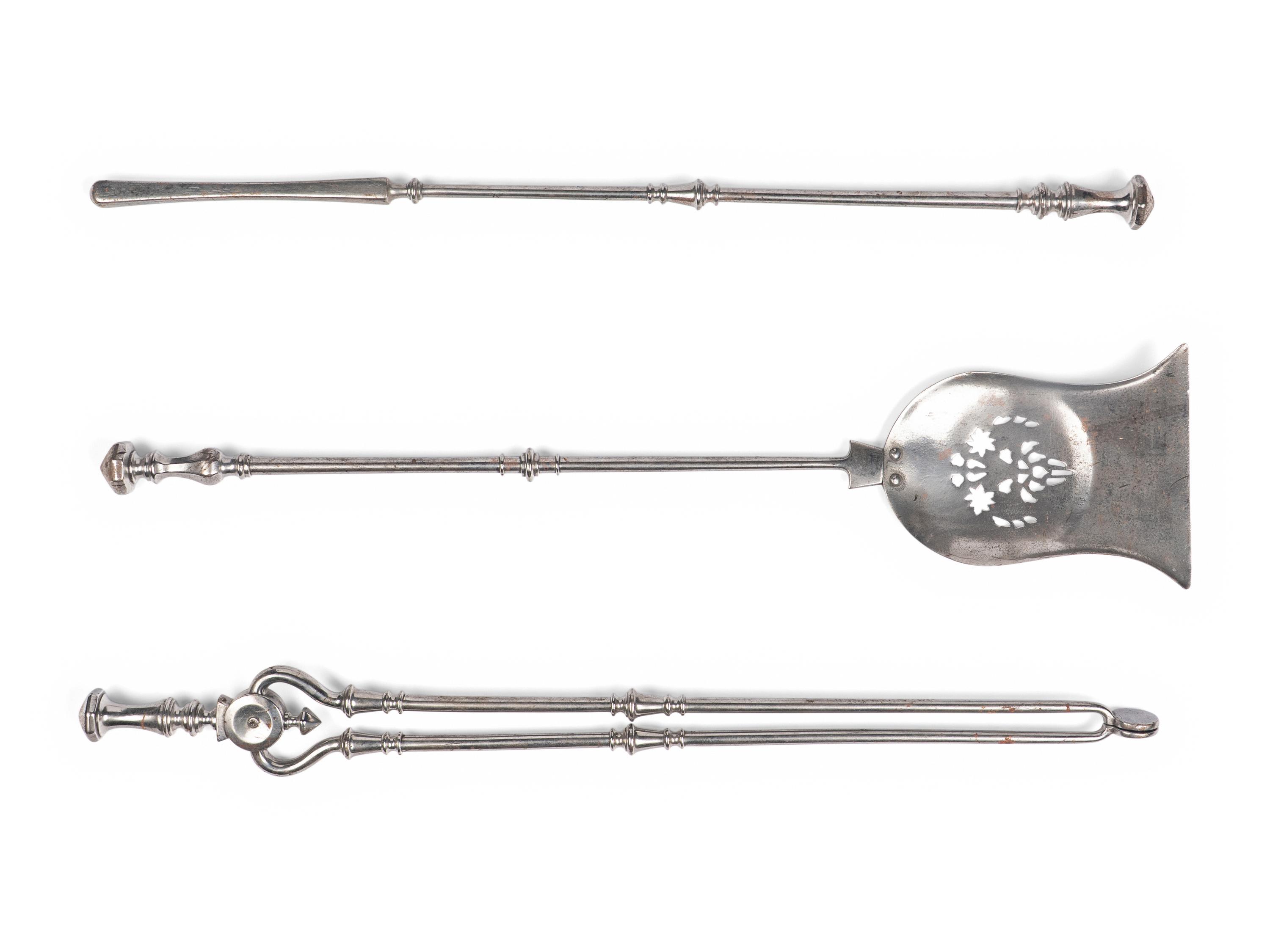 An English Brass Fireplace Fender and Pair of Andirons