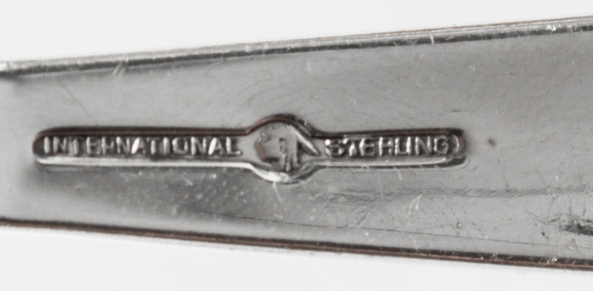 An American Silver Flatware Service, International Silver Co., Meriden, CT,, Empress pattern, comprising: 24 salad forks 12 dinner fork